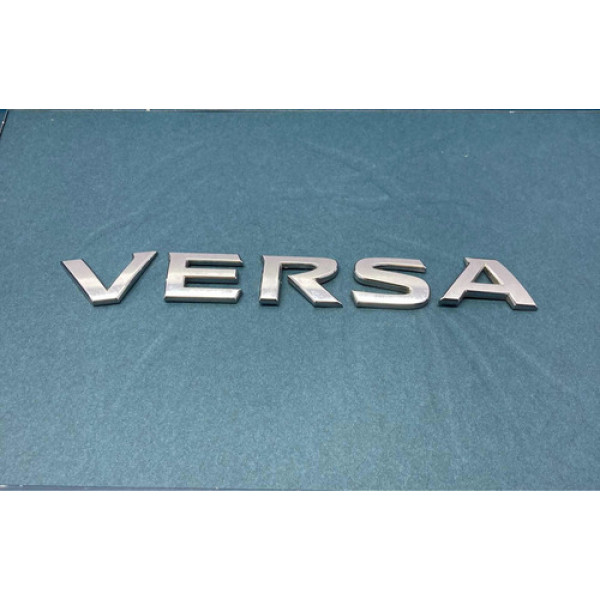 Emblema Escrita Capo Ts. Nissan Versa  2016