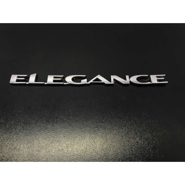 Emblema ( Elegance ) Porta Dianteira Direita Gm Vectra 06/12